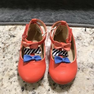 adorable coral and blue bow accents Girl flat and strap dress shoes